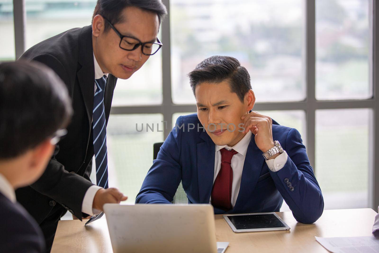 Multiethnic diverse group of business coworkers in team meeting discussion by chuanchai