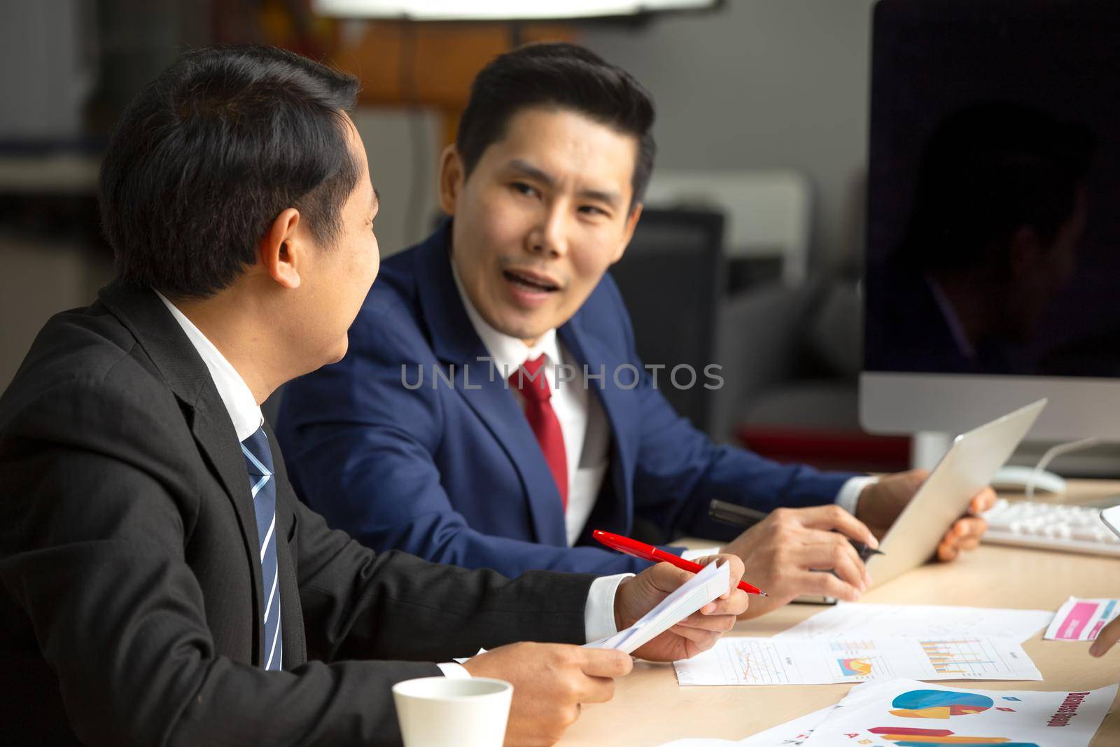 Business peeople meeting in office by chuanchai