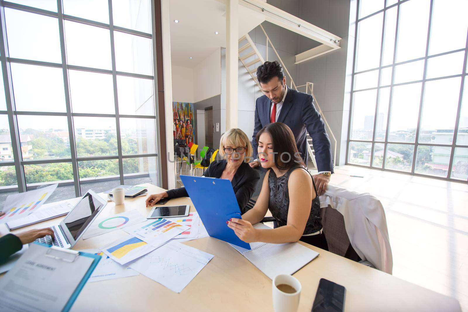 Business peeople meeting in office by chuanchai