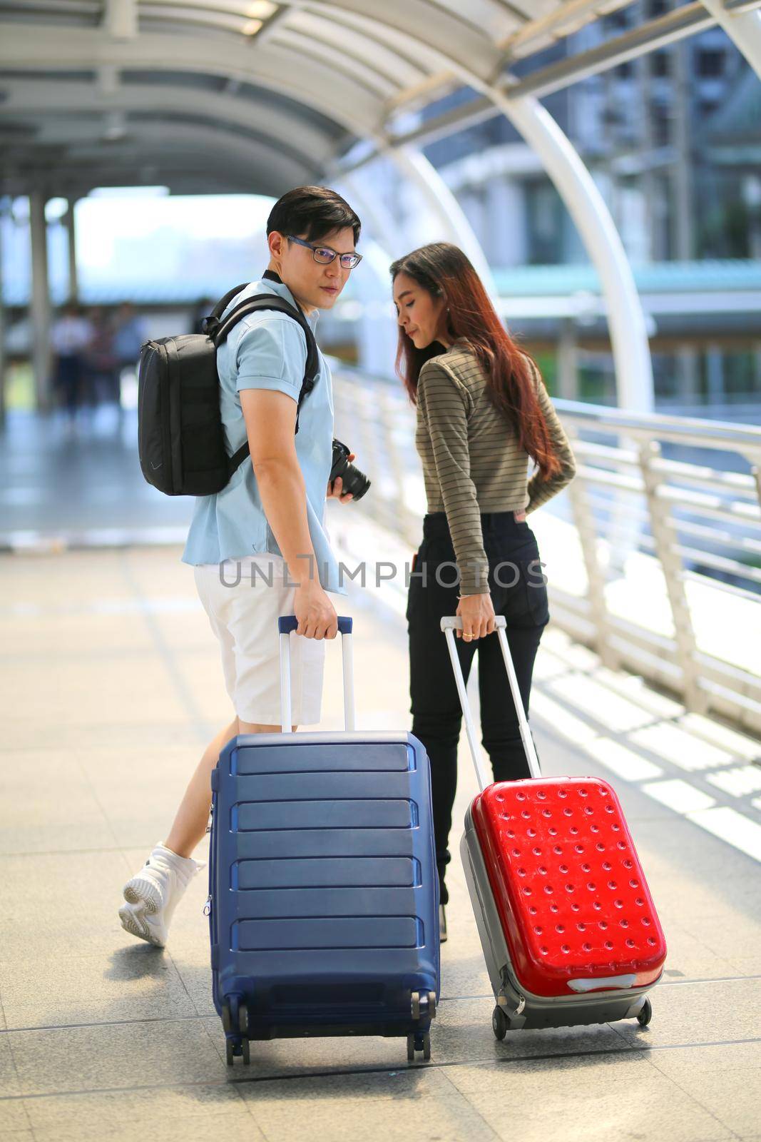 Couple love on summer vacation travel. Man and Woman walking on city romantic honeymoon, couple lover on travel concept. by chuanchai