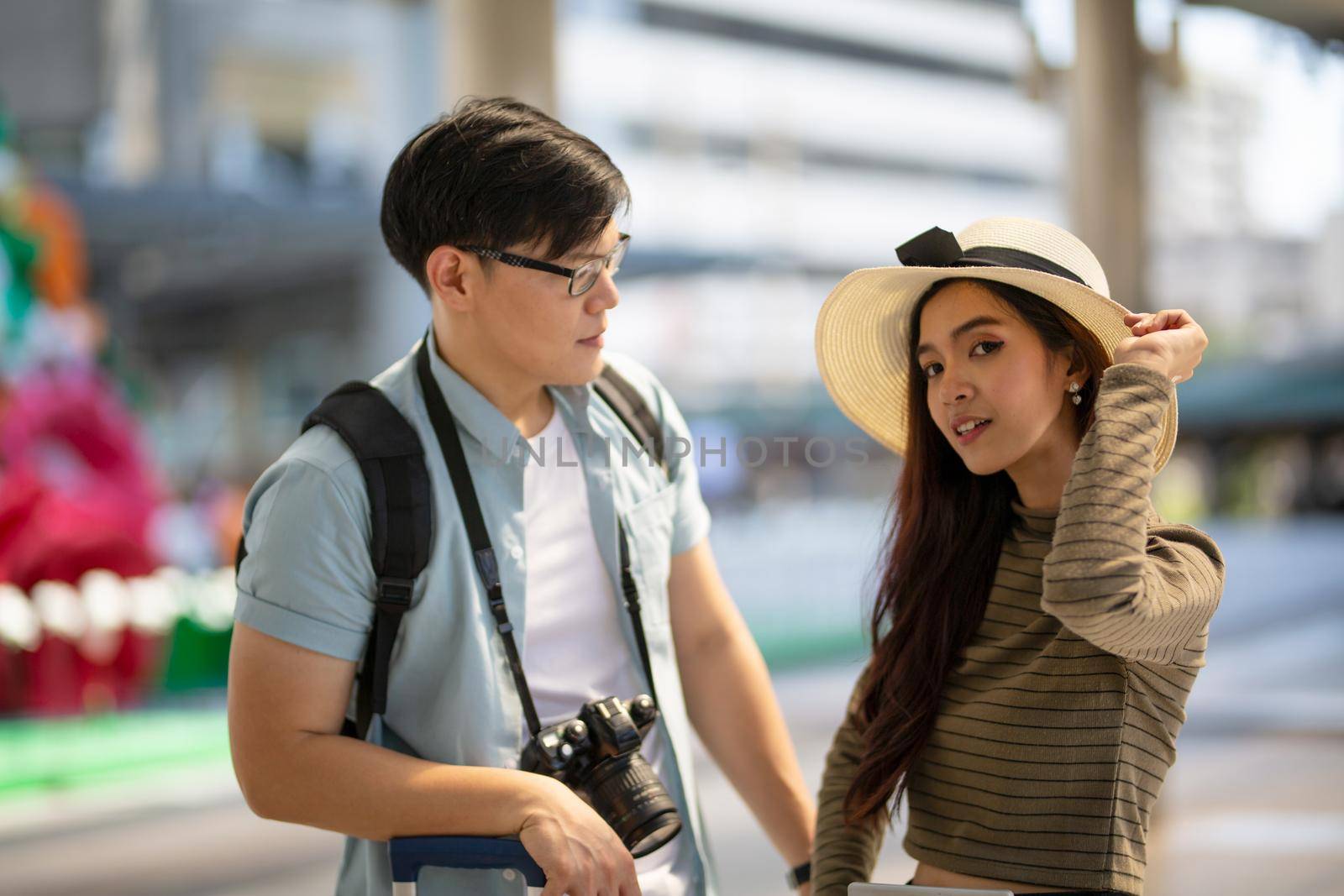 Couple love on summer vacation travel. Man and Woman walking on city romantic honeymoon, couple lover on travel concept. by chuanchai