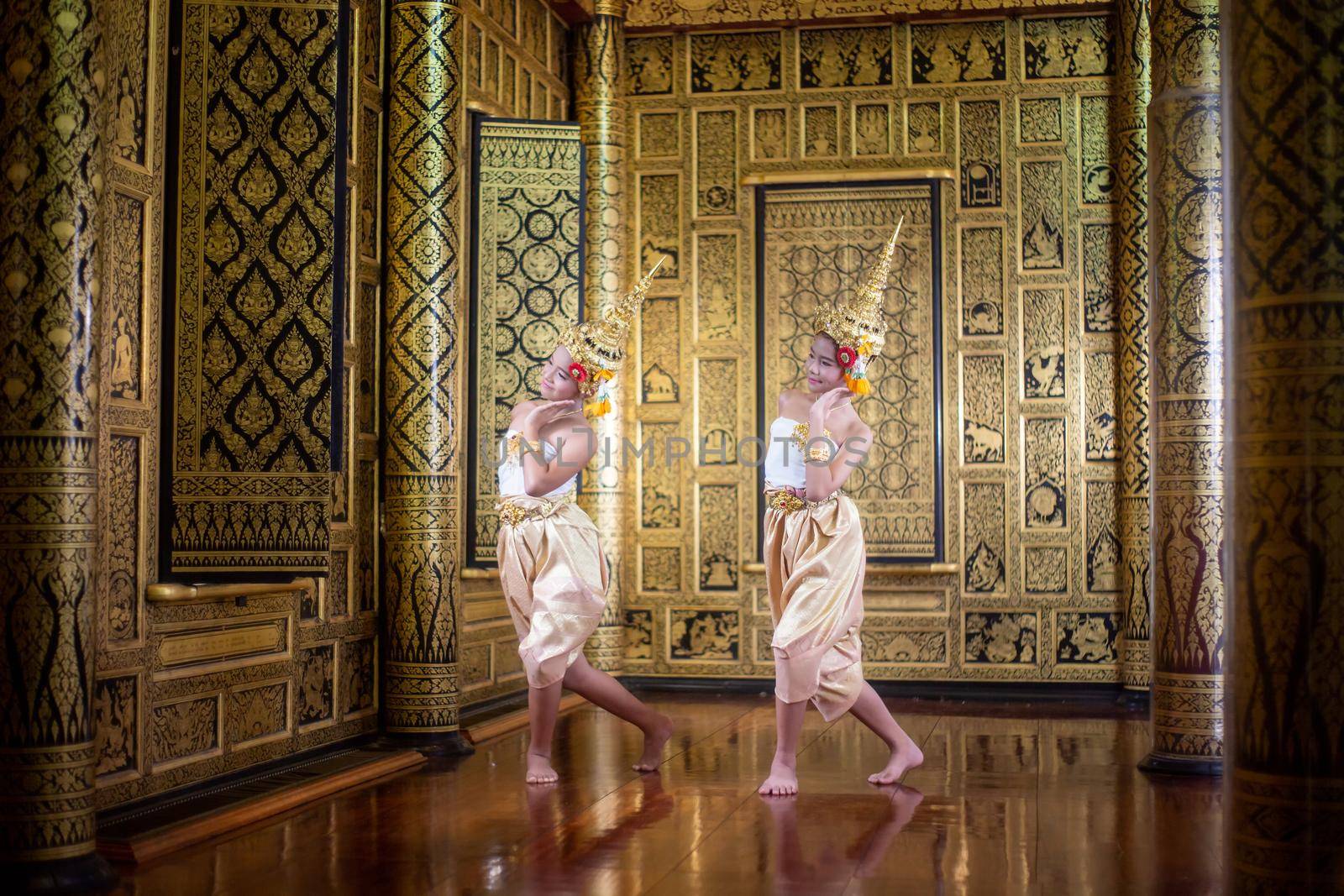 Thai traditional dress. Young kid Actors performs Thai ancient dancing Art of Thai classical dance in Thailand