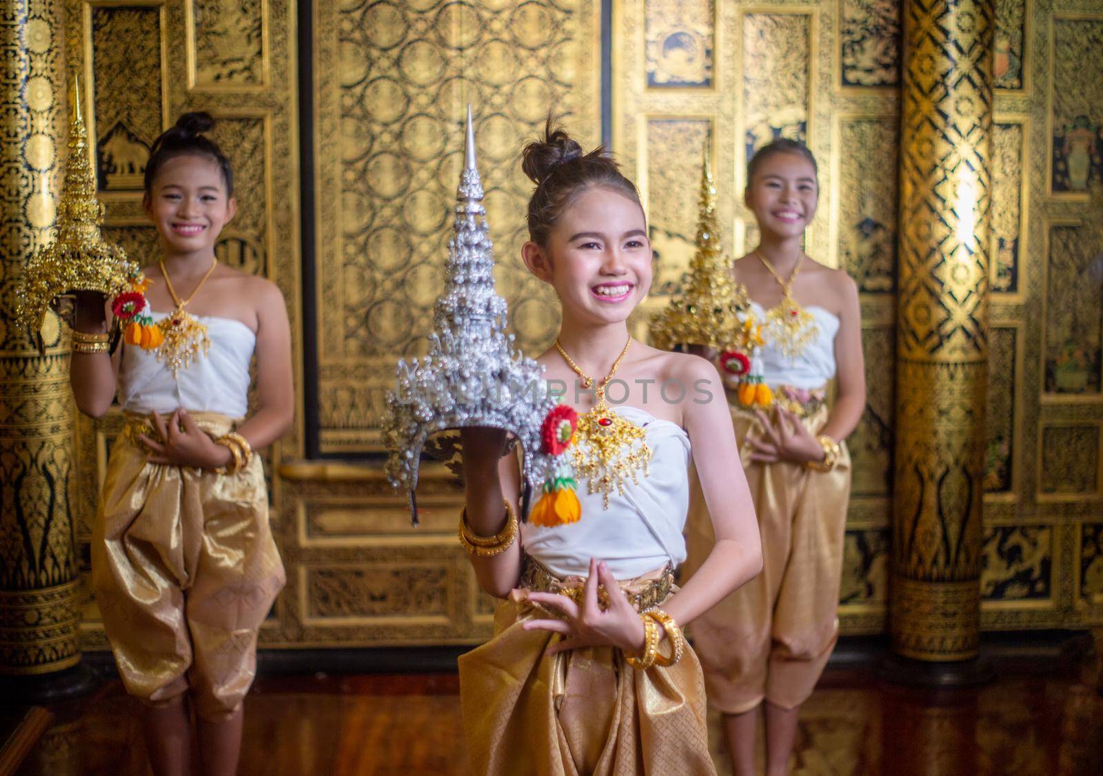 Thai traditional dress. Young kid Actors performs Thai ancient dancing Art of Thai classical dance in Thailand