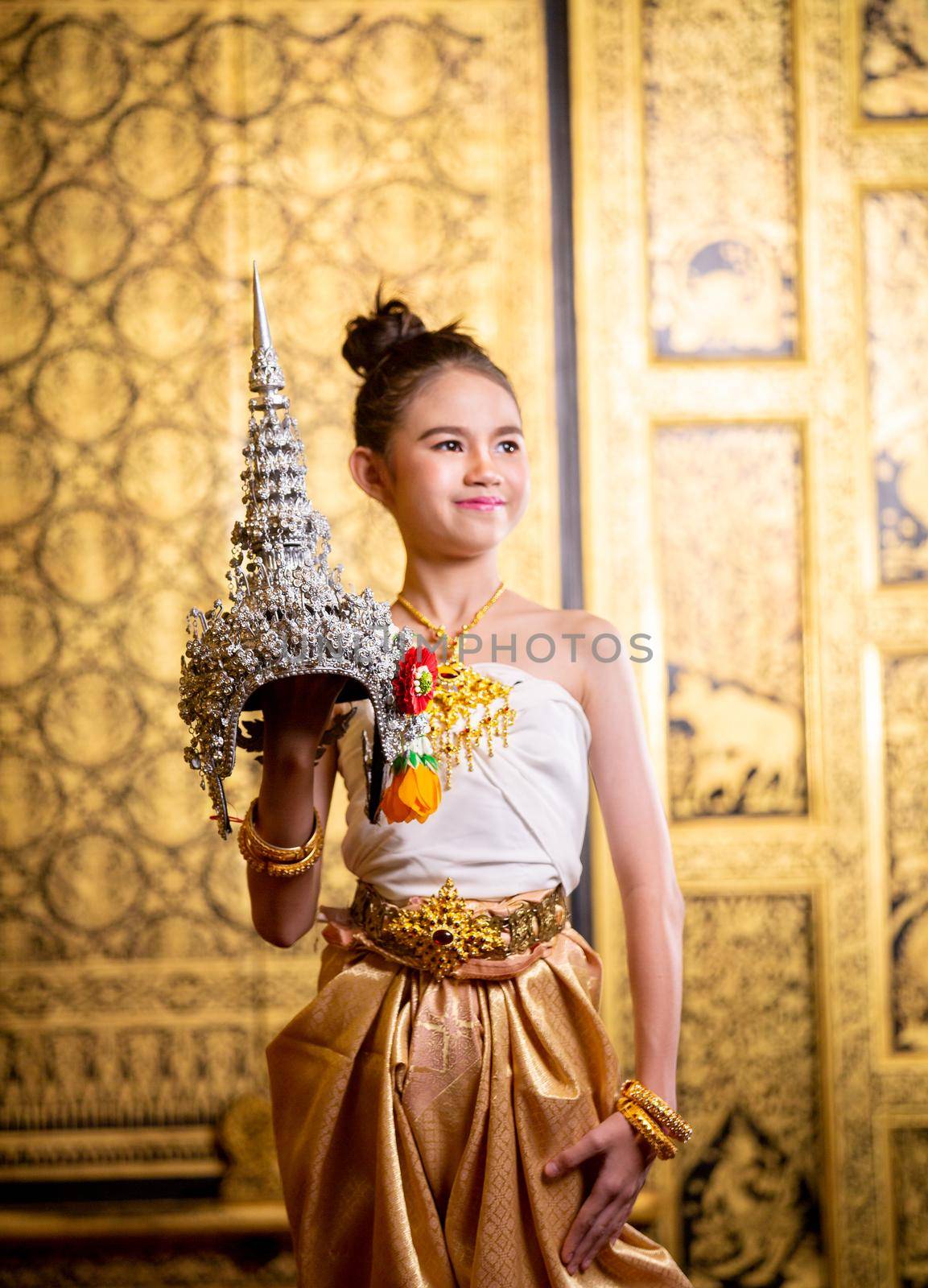 Thai traditional dress. Young kid Actors performs Thai ancient dancing Art of Thai classical dance in Thailand by chuanchai
