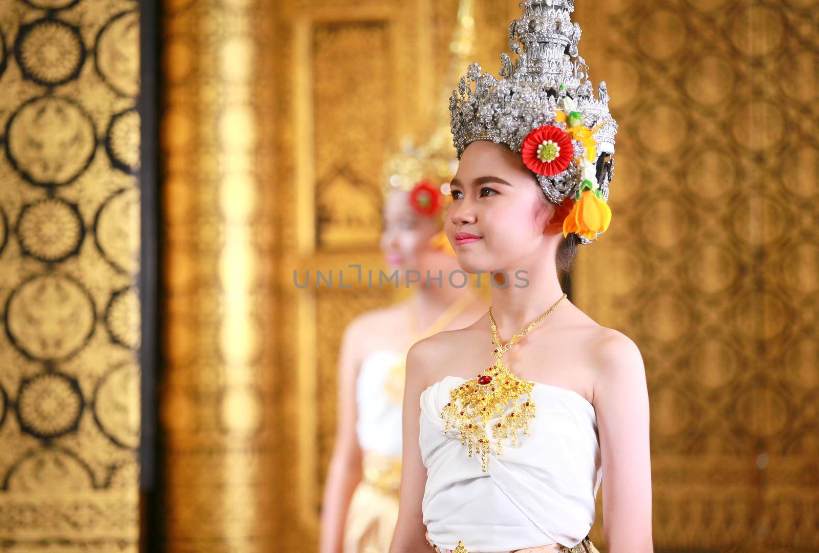 Thai traditional dress. Young kid Actors performs Thai ancient dancing Art of Thai classical dance in Thailand
