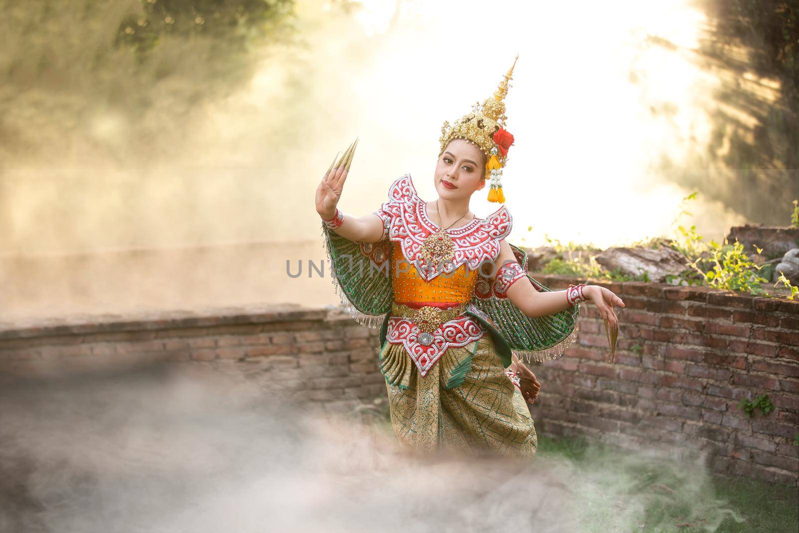 Beautiful Thai young woman portrait in Kinnaree traditional dress costume Art culture Thailand Dancing in masked khon Kinnaree in literature amayana, thailand culture Khon, Ayuttaya, Thailand .