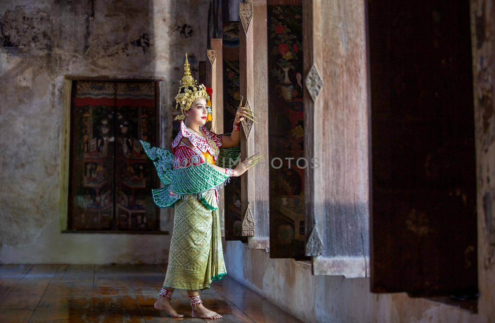 Beautiful Thai young woman portrait in Kinnaree traditional dress costume Art culture Thailand Dancing in masked khon Kinnaree in literature amayana, thailand culture Khon, Ayuttaya, Thailand .