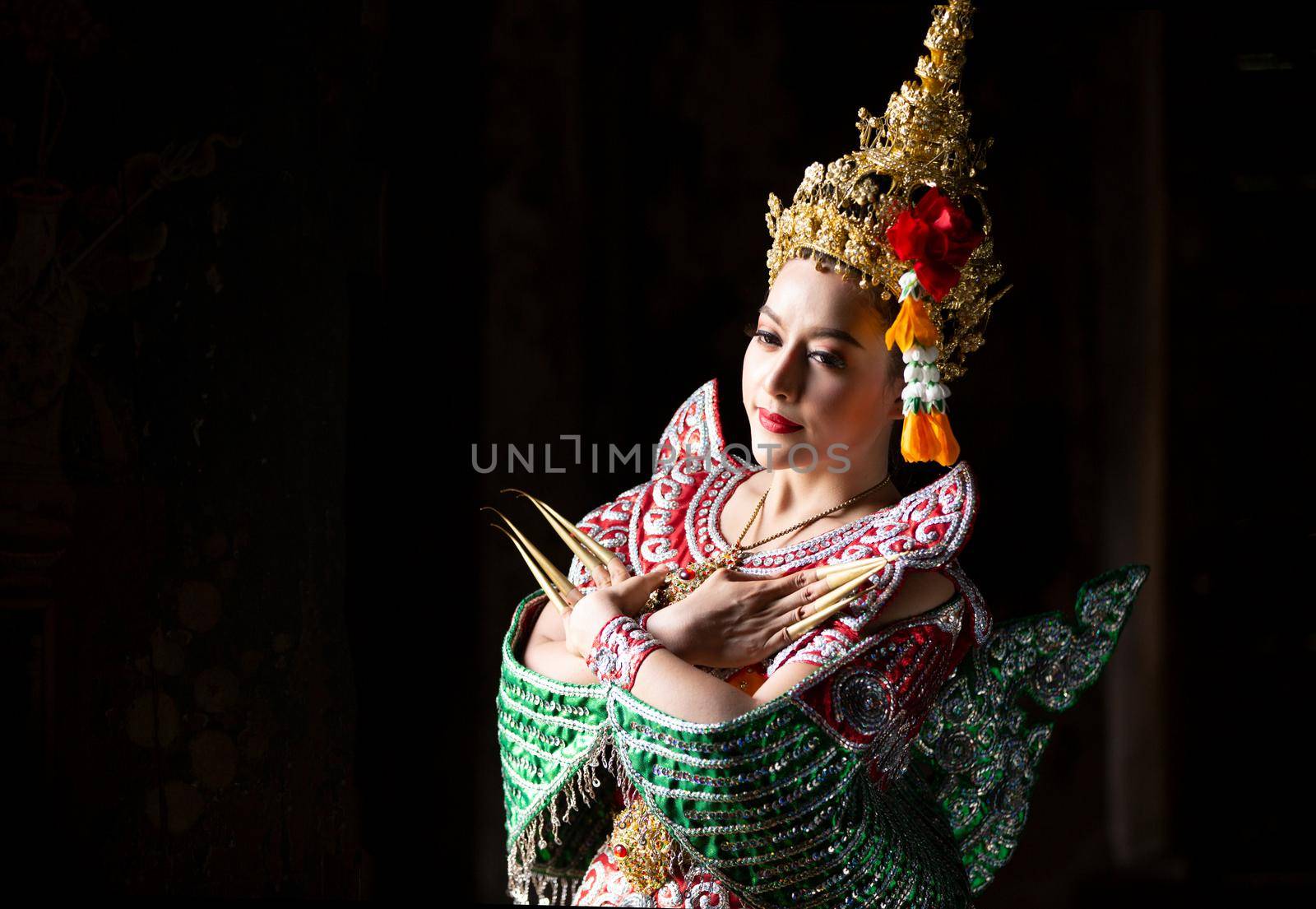 Beautiful Thai young woman portrait in Kinnaree traditional dress costume Art culture Thailand Dancing in masked khon Kinnaree in literature amayana, thailand culture Khon, Ayuttaya, Thailand . by chuanchai