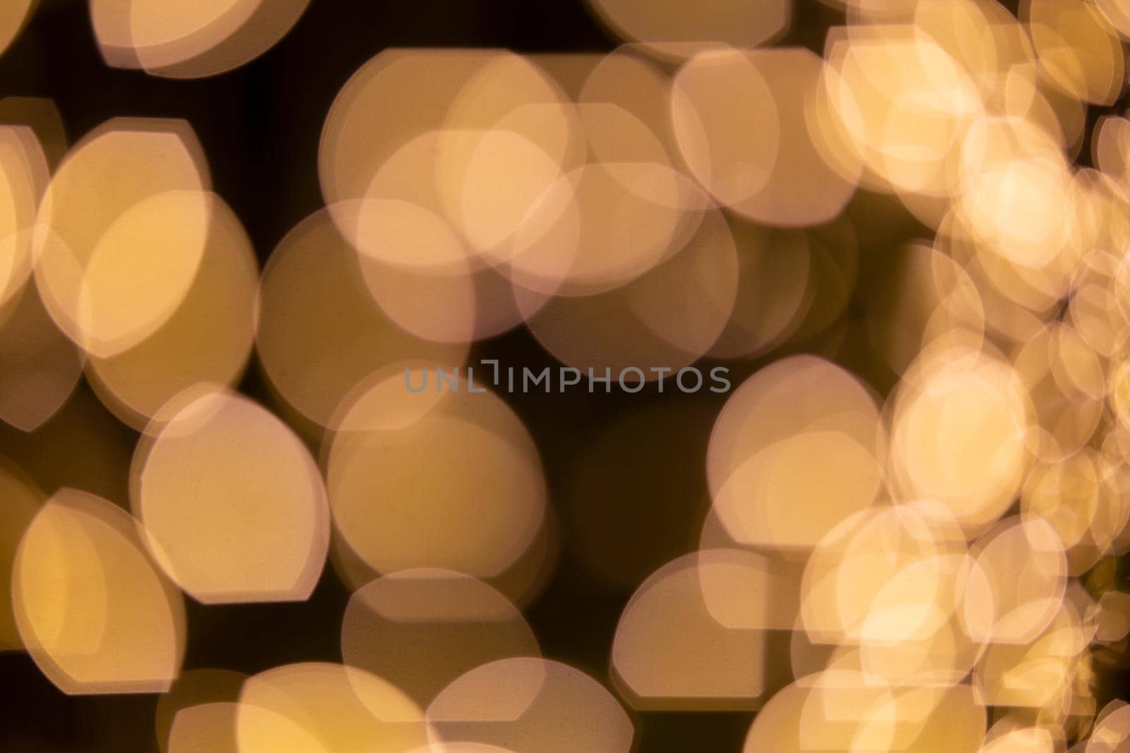 Abstract blurred Christmas light bokeh background. by chuanchai