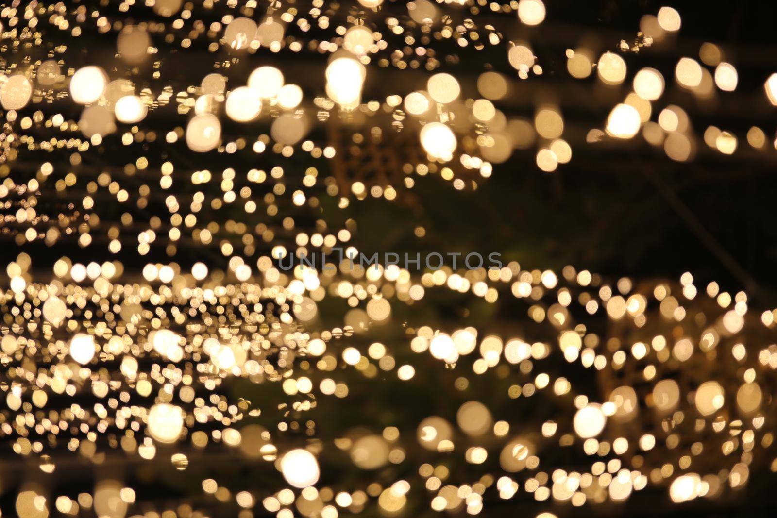 Abstract bokeh light background. by chuanchai