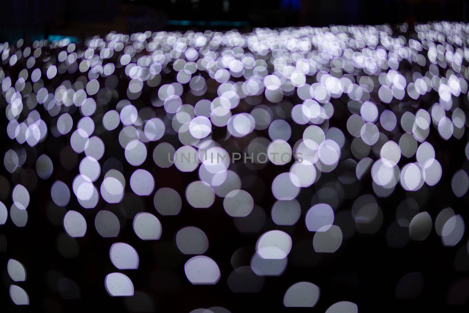 Abstract blurred Christmas light bokeh background.