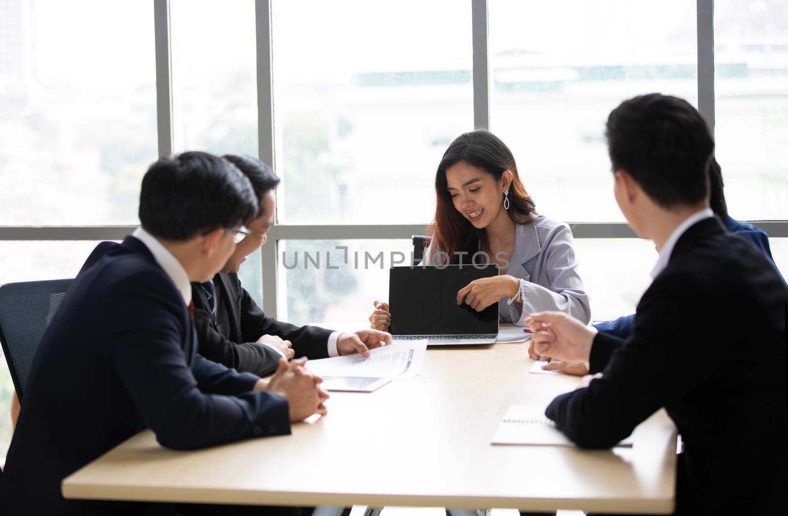 Colleagues working in a call center. by chuanchai