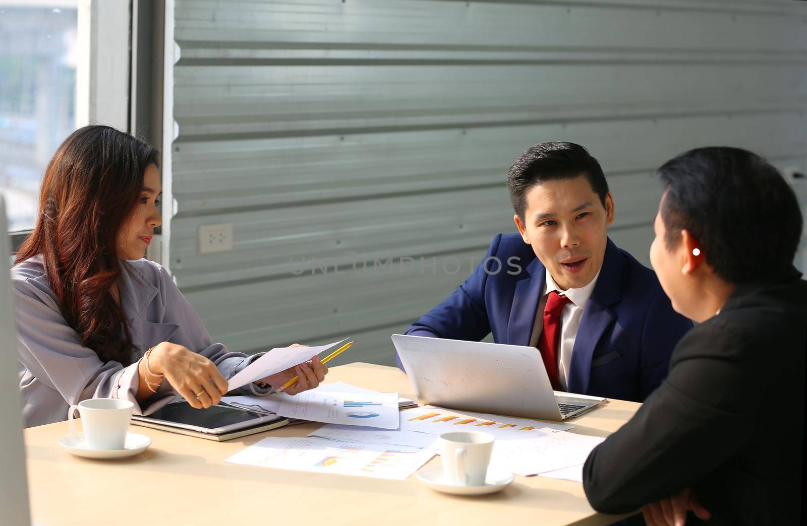 Business peeople meeting in office by chuanchai