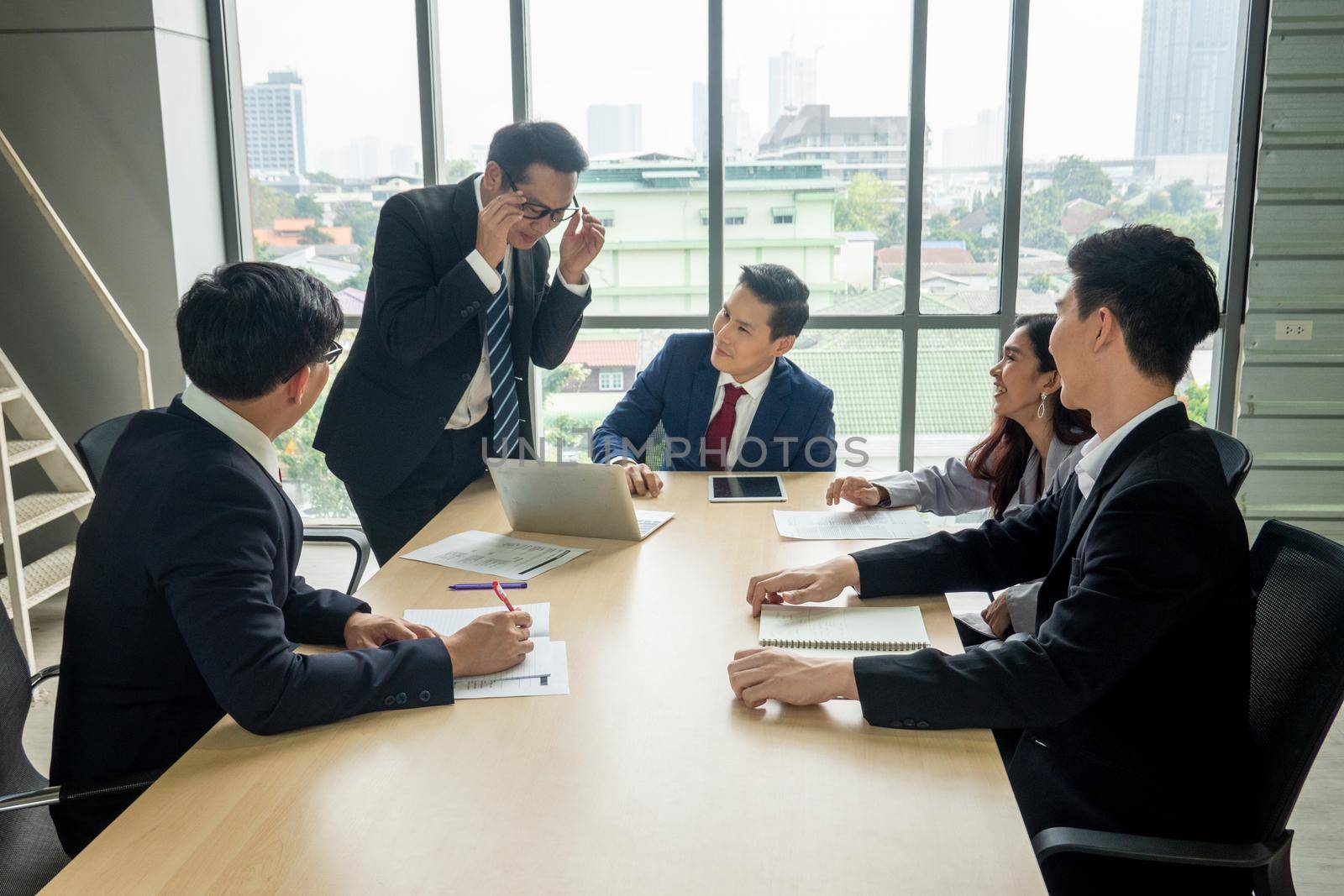 Business peeople meeting in office by chuanchai