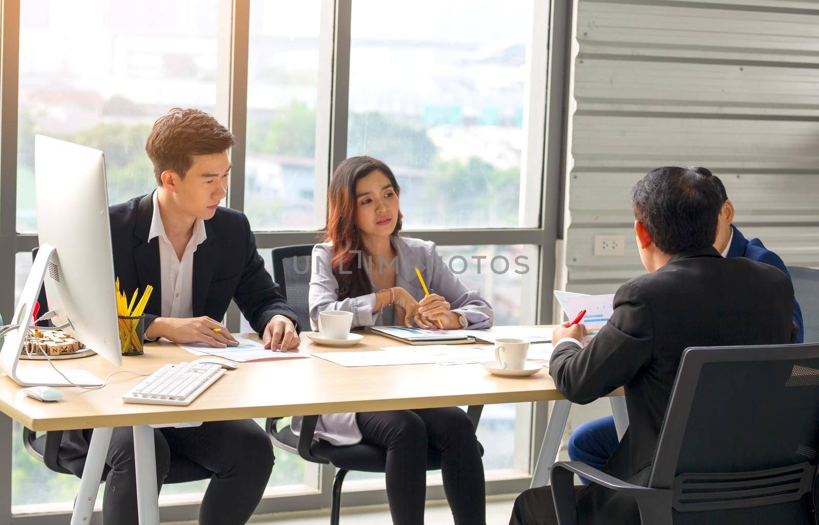 Multiethnic diverse group of business coworkers in team meeting discussion