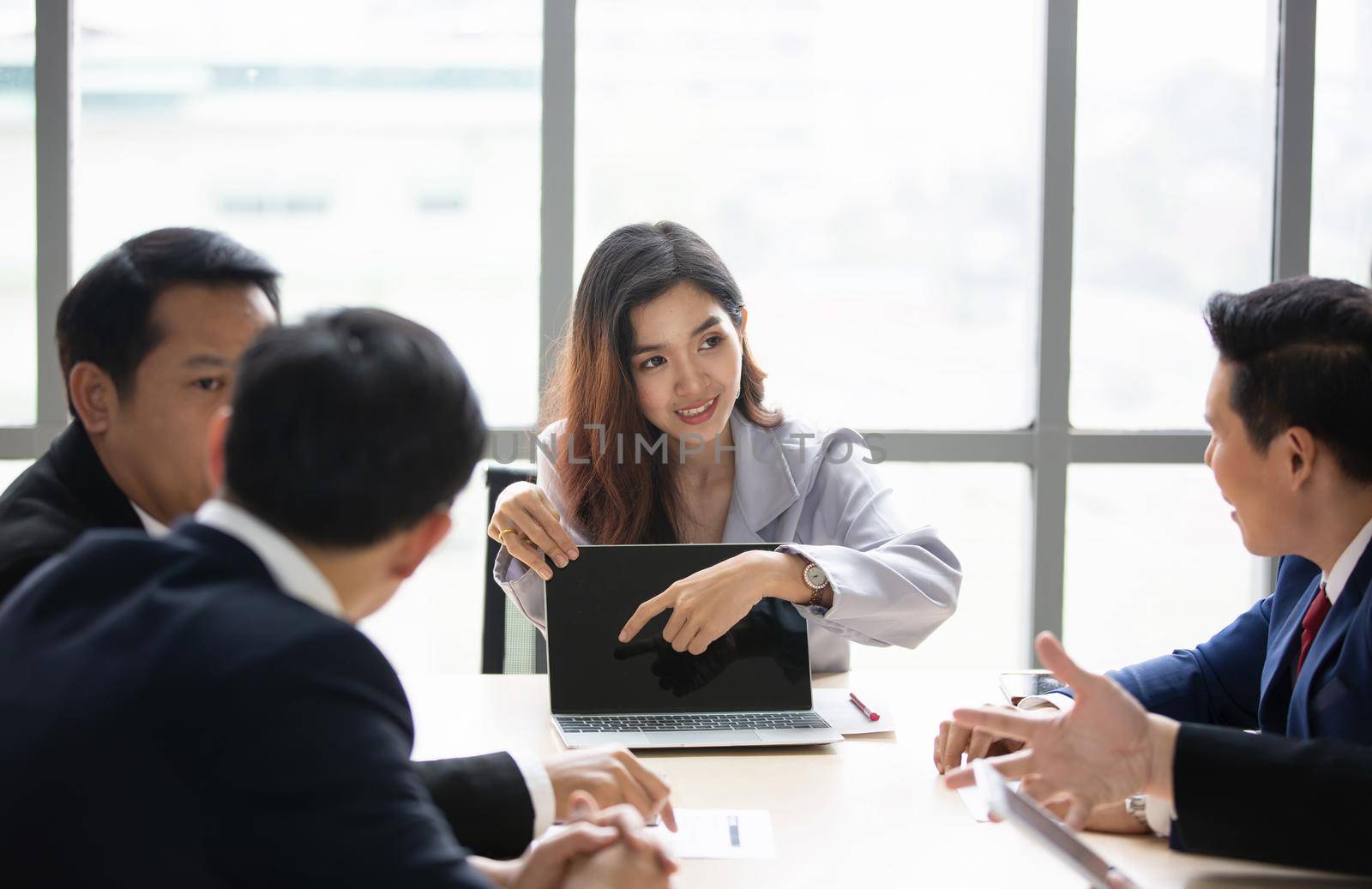 Multiethnic diverse group of business coworkers in team meeting discussion by chuanchai