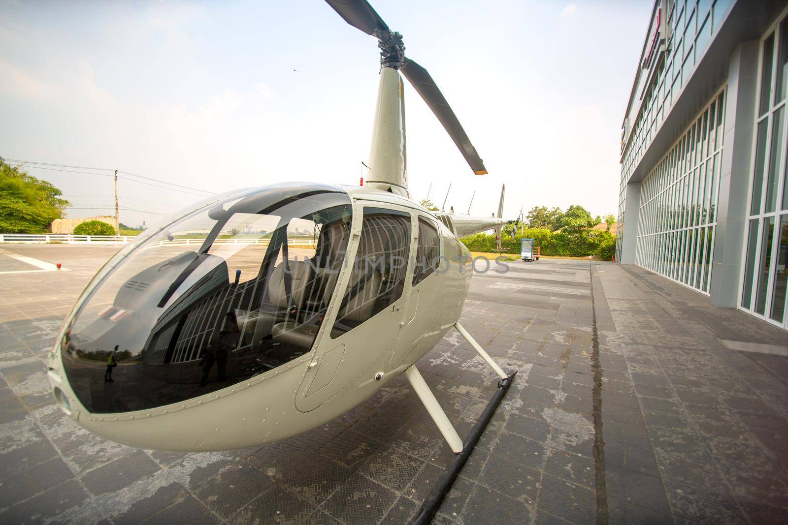 private commercial Helicopter parking by airport terminal by chuanchai