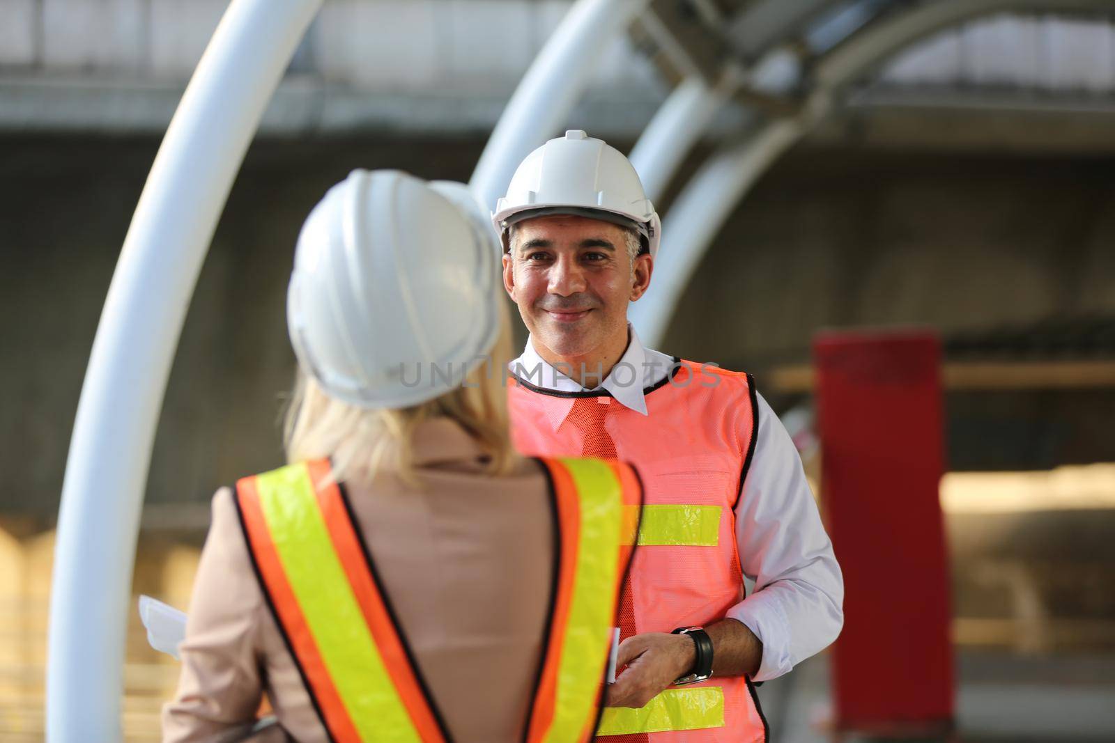 Engineering civil, Construction engineers discussion with architects at construction site or building site of high-rise building with Surveying for making contour plans by chuanchai