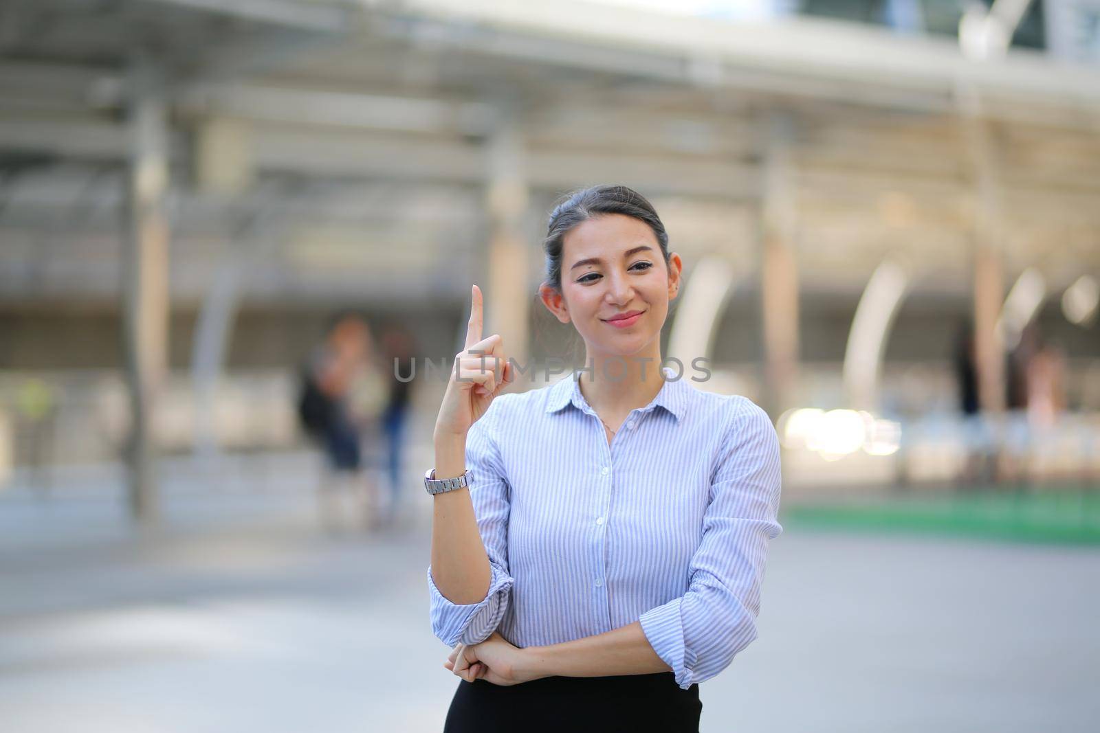 Portrait of cheerful business women standing outdoor.