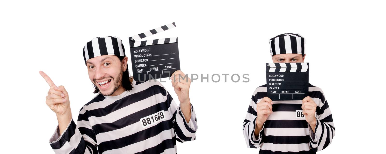 Funny prison inmate with movie board isolated on white by Elnur