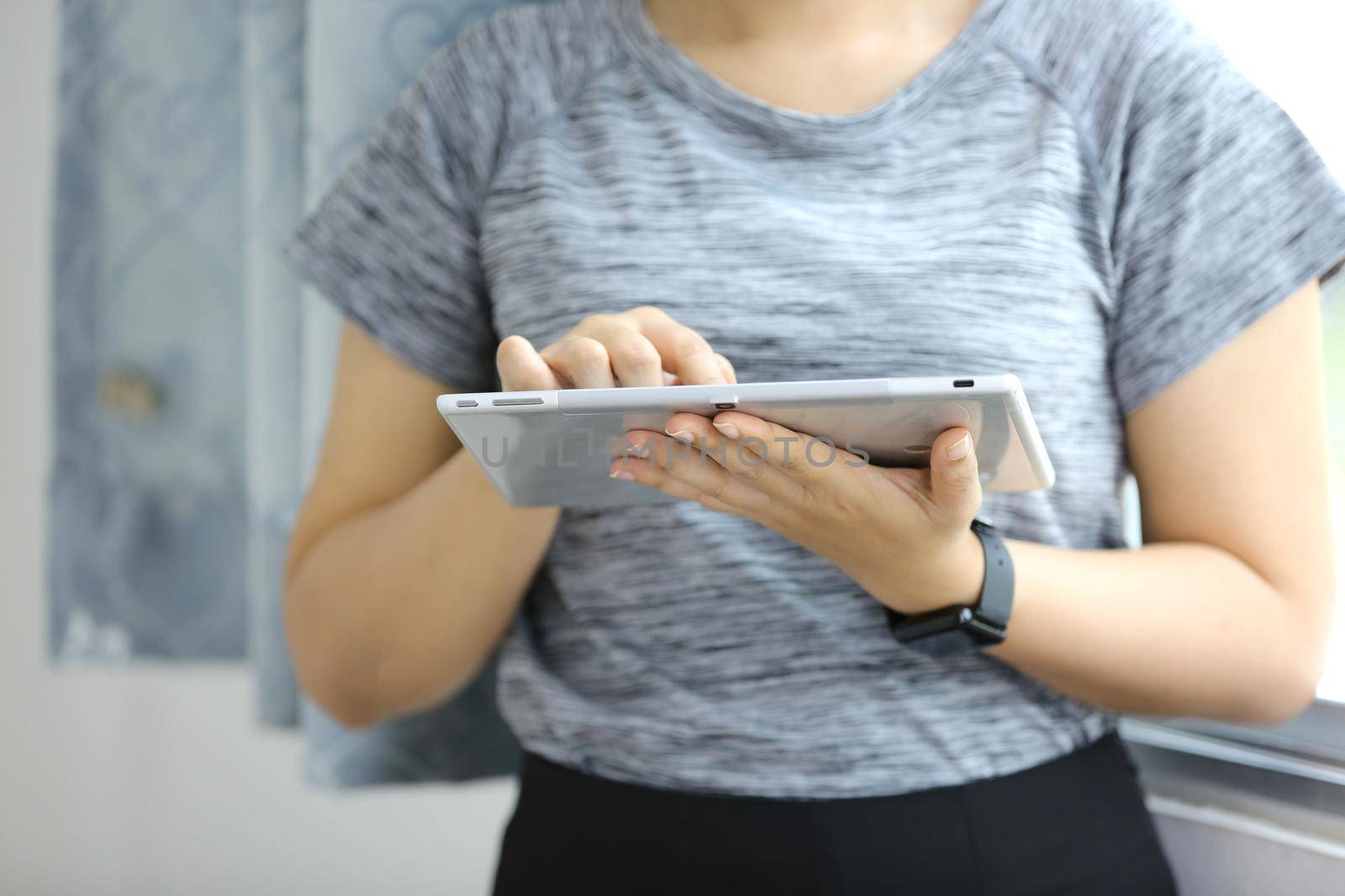 close up hands multitasking woman using tablet, laptop and cellphone connecting wifi