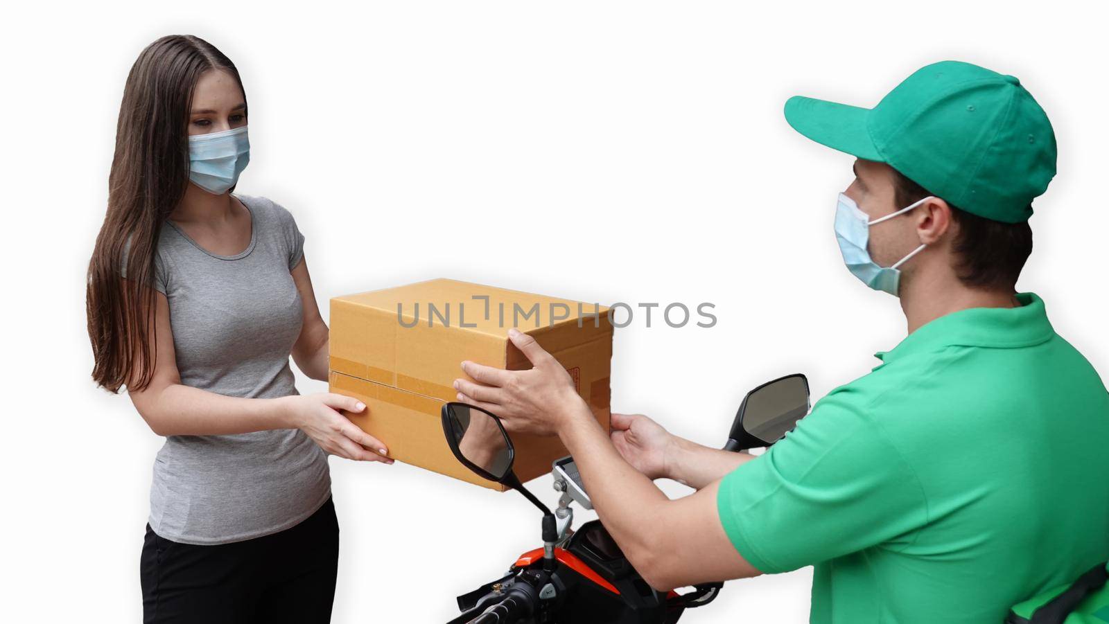 Close up young woman receiving package box from postman in front of house after check order from internet , delivery transport and online shop concept