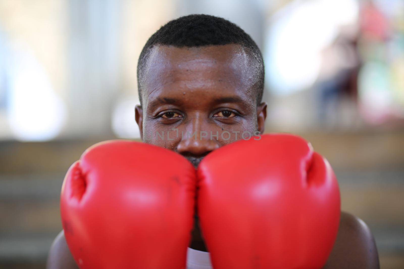 young athlete people with boxing gloves, exercise in fitness gym