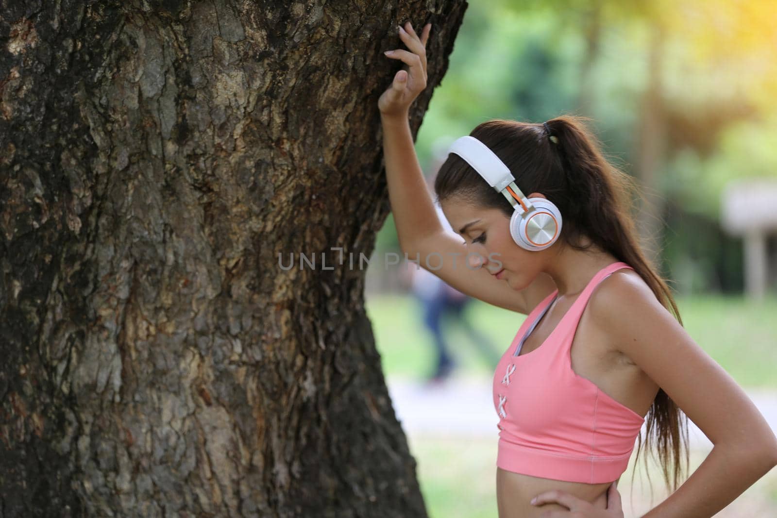 Athletic young people in sportswear doing fitness stretching exercises at fitness gym. Sport and recreation concept. by chuanchai