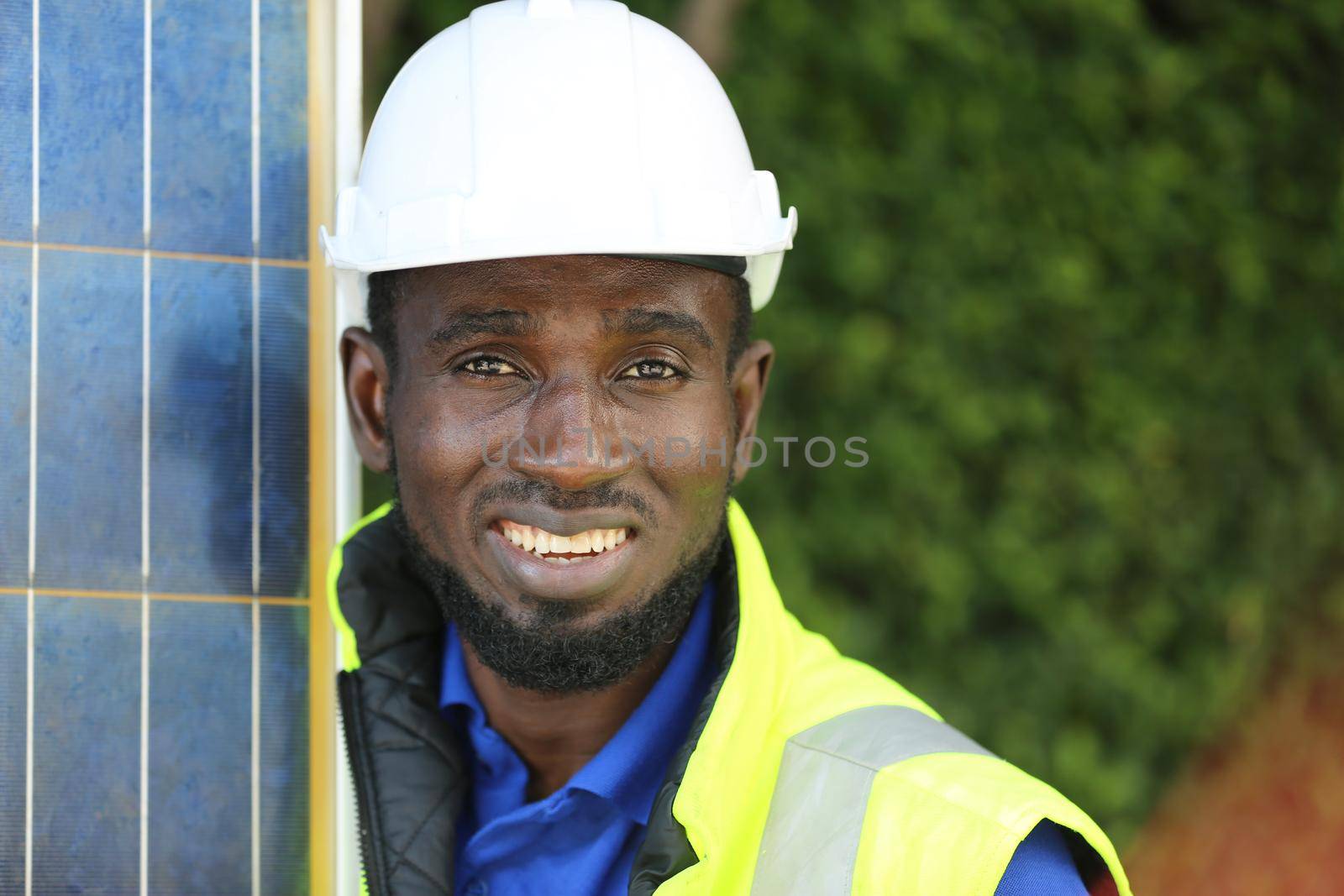 maintenance engineer, Solar energy systems engineer perform analysis solar panels, Portrait of engineer man or worker, people, with solar panels or solar cells on the roof in farm. Power plant with green field, renewable energy source in American. Eco technology for electric power.