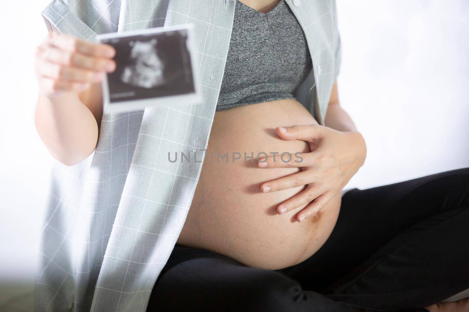 pregnant woman closeup of belly