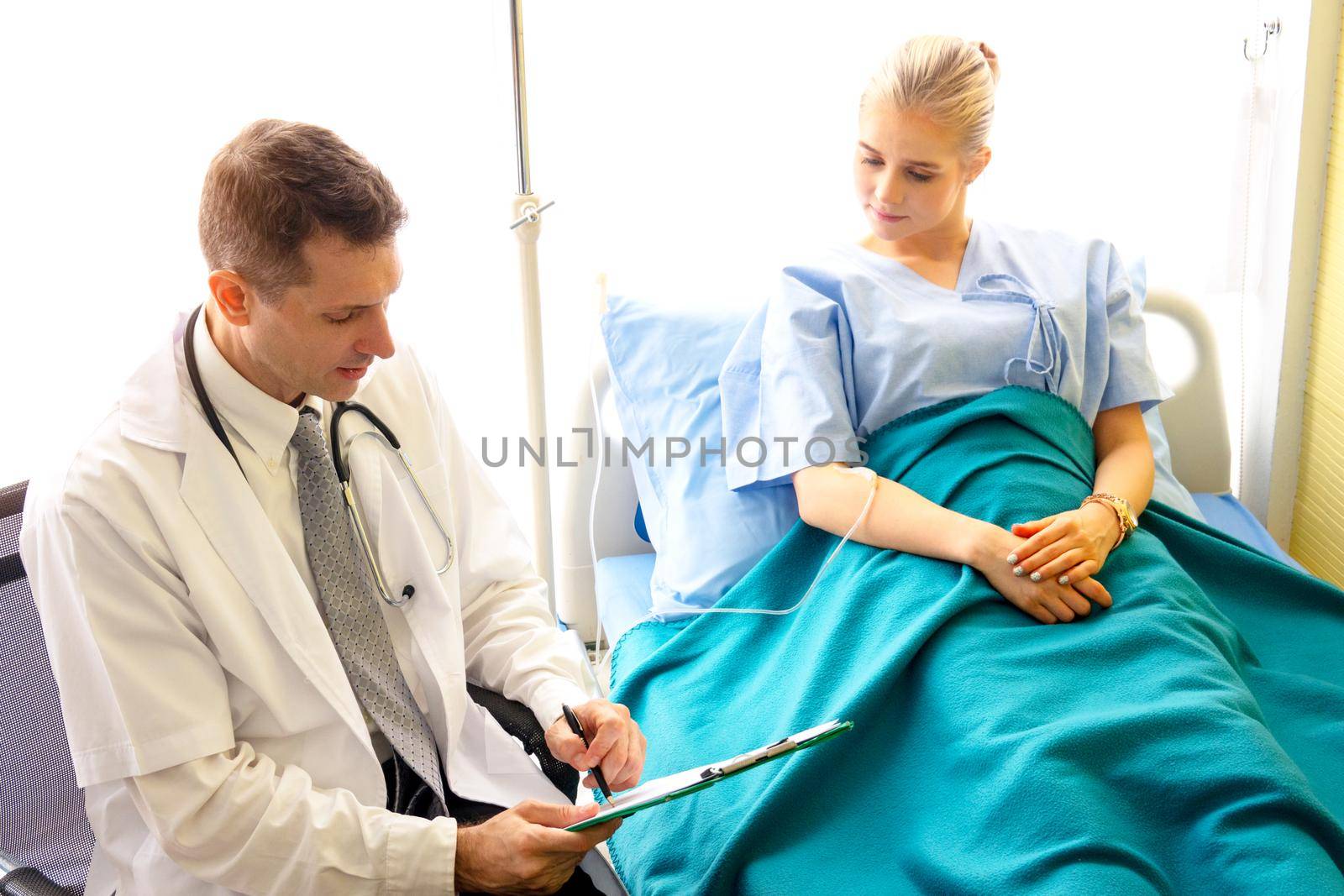 Doctor check up and discuss with patient in clinic or doctor talk with women patient in hospital