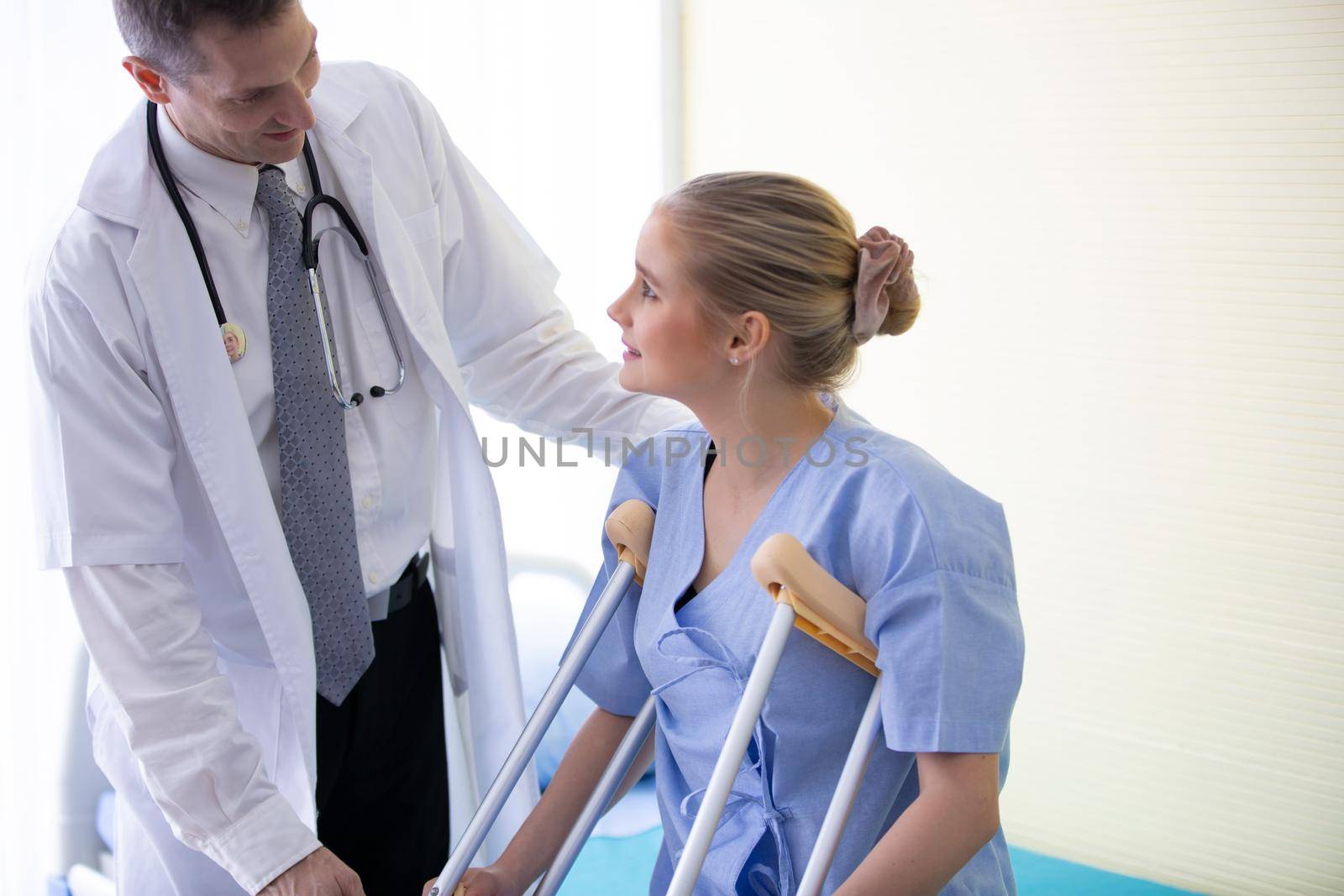 Doctor and patient in hospital by chuanchai