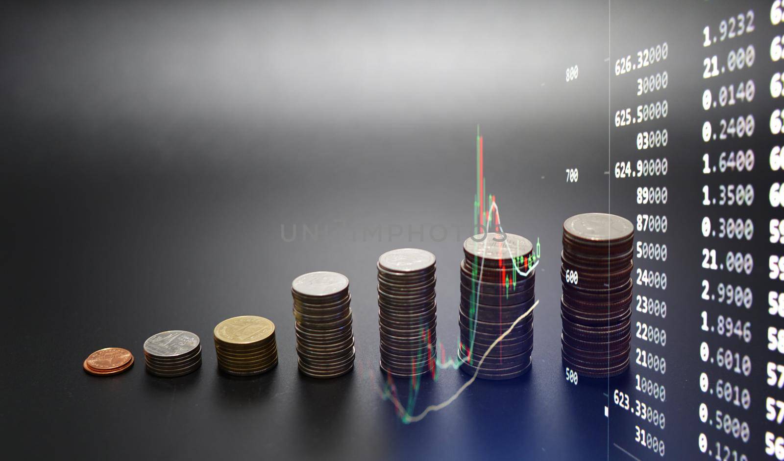 Creative forex chart on monitor. Finance and invest concept. Double exposure. Growing Money - Plant On Coins - Finance And Investment Concept