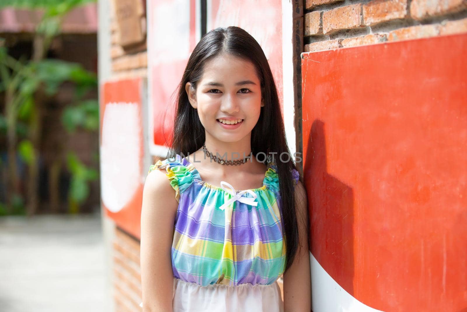 portrait of young charming beautiful girl with smile, authentic moments of real emotion.