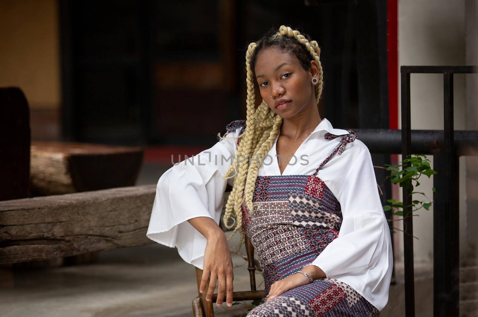 Outdoor Portrait Of African American Young Woman by chuanchai