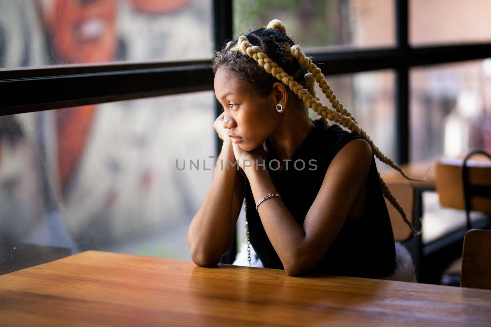 Outdoor Portrait Of African American Young Woman by chuanchai