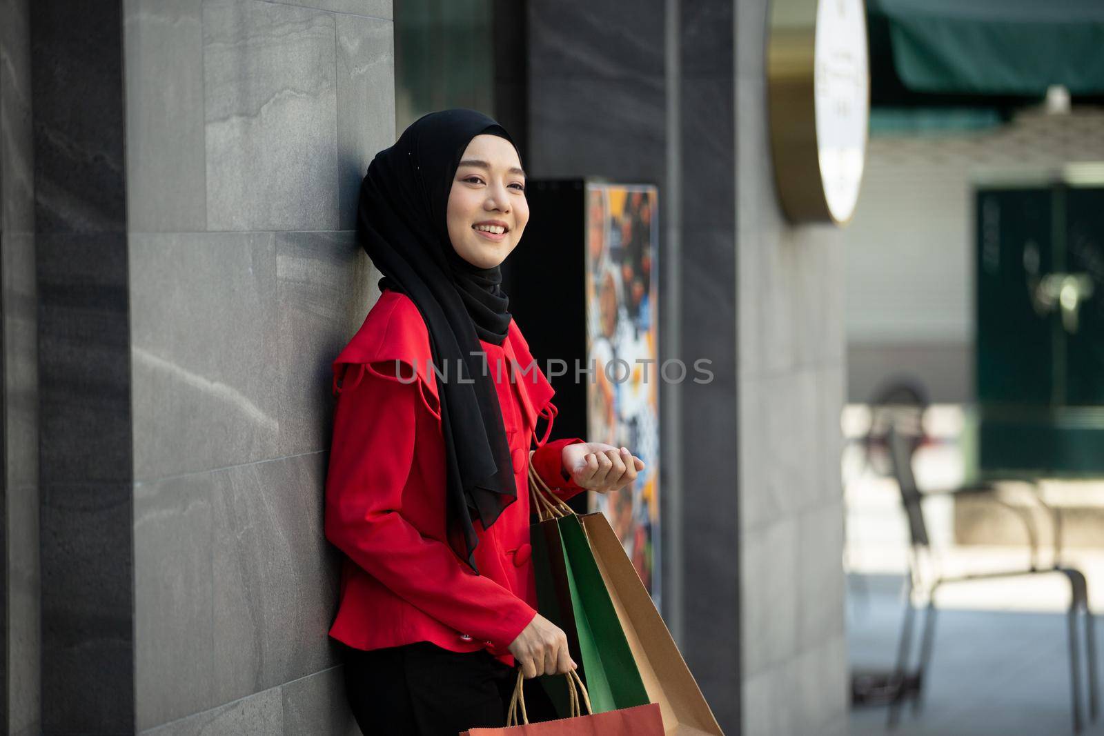 Woman with Shopping Bags by chuanchai