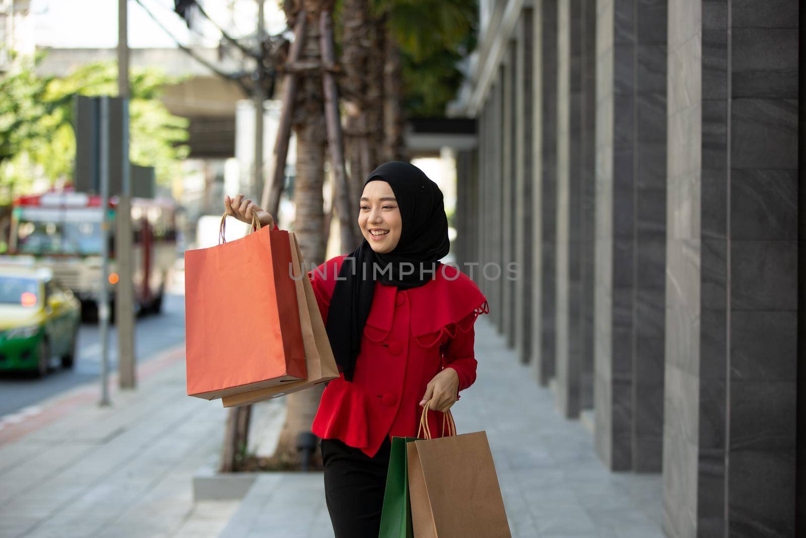Woman with Shopping Bags by chuanchai