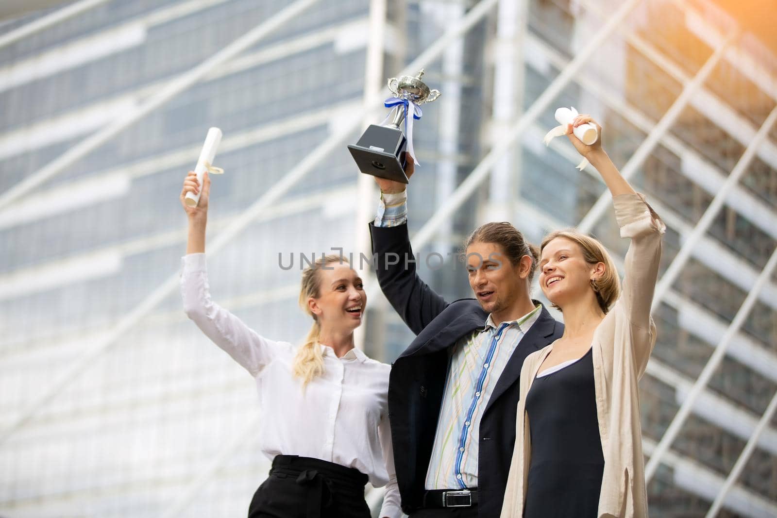 Business People Walking Handshake Professional Urban City Concept., Business people working in office on desktop computer, Group of happy business people in smart casual wear looking at the laptop and gesturing. Achieving success. by chuanchai