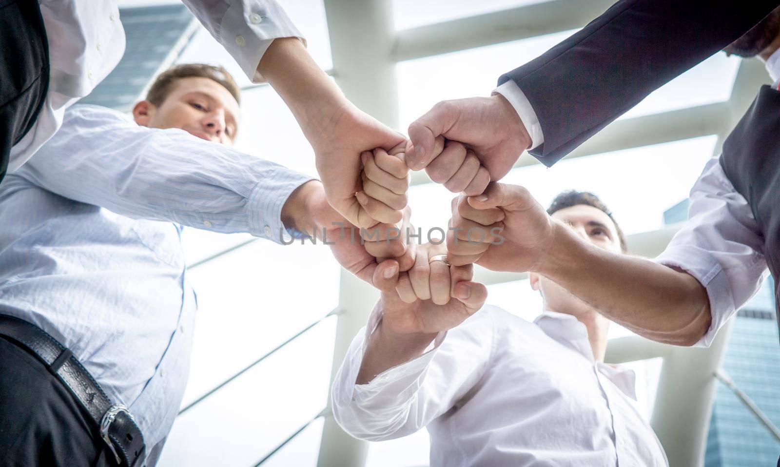 Lowsection Of Businessmen Shaking Hands, Business handshake, deal made. professionals by chuanchai