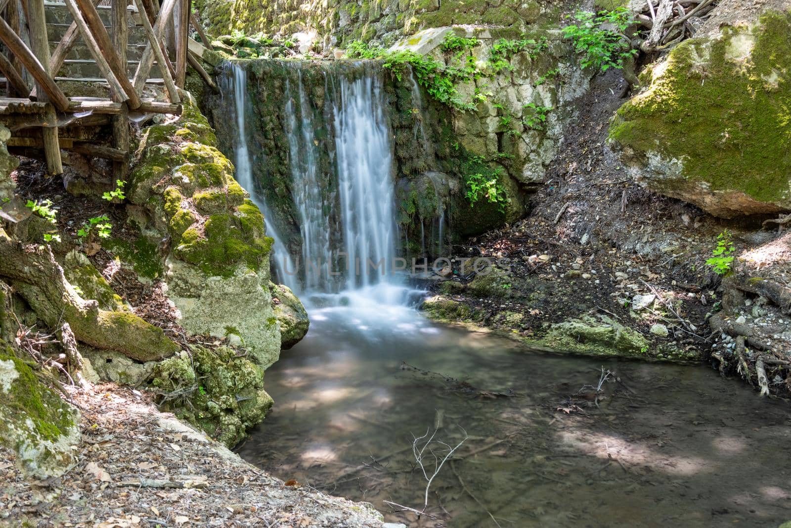 Waterfall in the valley of butterflies (Petaloudes) on Greek island Rhodes 