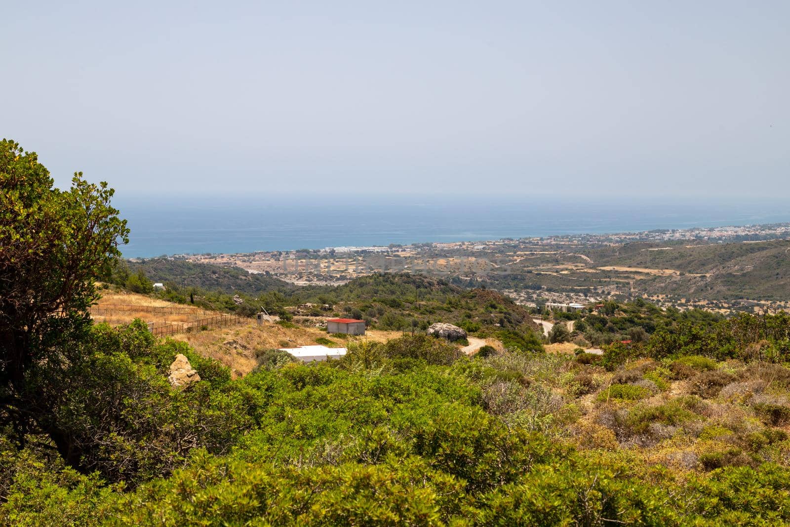 Scenic view at landscape nearby Asklipio with the coastline in background on Rhodes island, Greece
