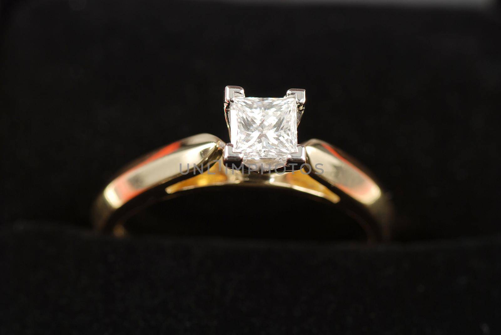 stock picture of a engagement ring with a diamond