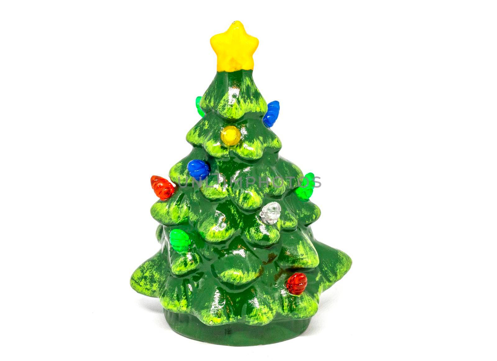 A handmade ceramic Christmas tree, isolated on a white background