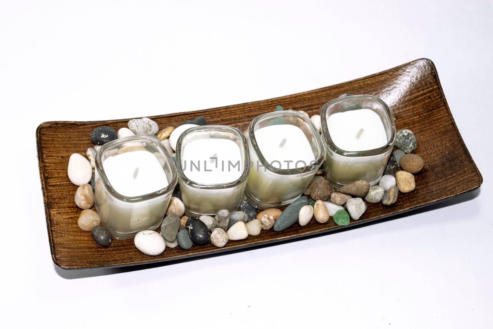 Candle ornament with colored pebbles
