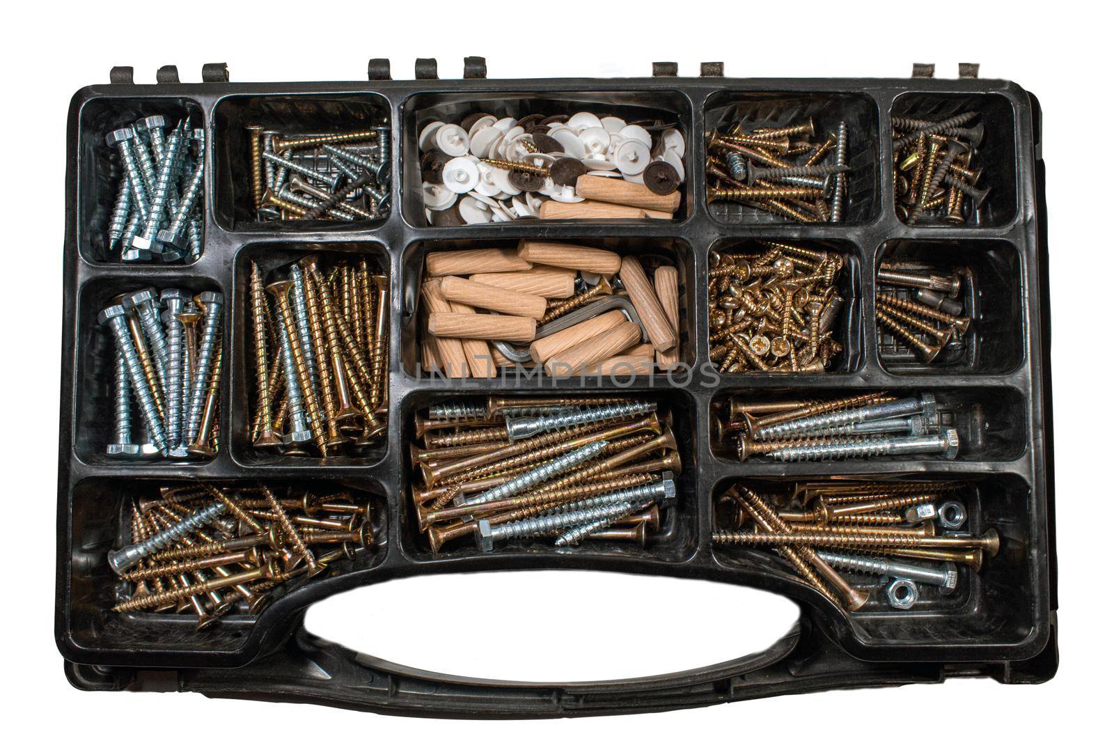 Kit with construction materials, screws, nails, dowels