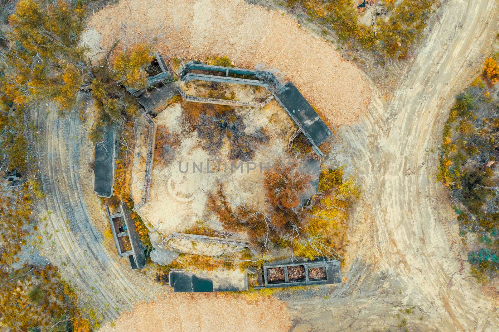 Aerial photograph of structural ruins and forest after bushfires in regional Australia by WittkePhotos