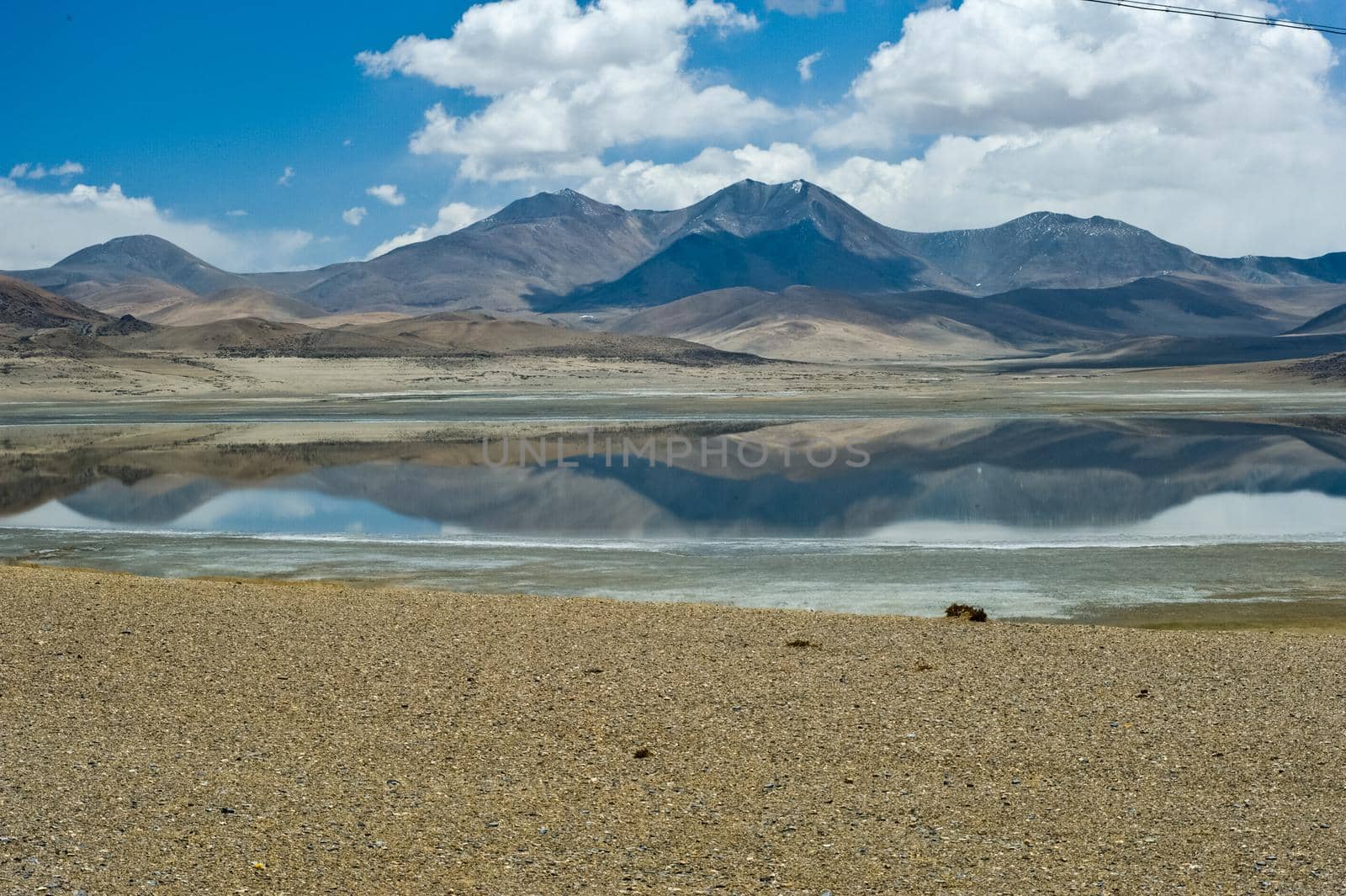 A lake in the Himalayas. Tibet, large lake in the highlands. by DePo