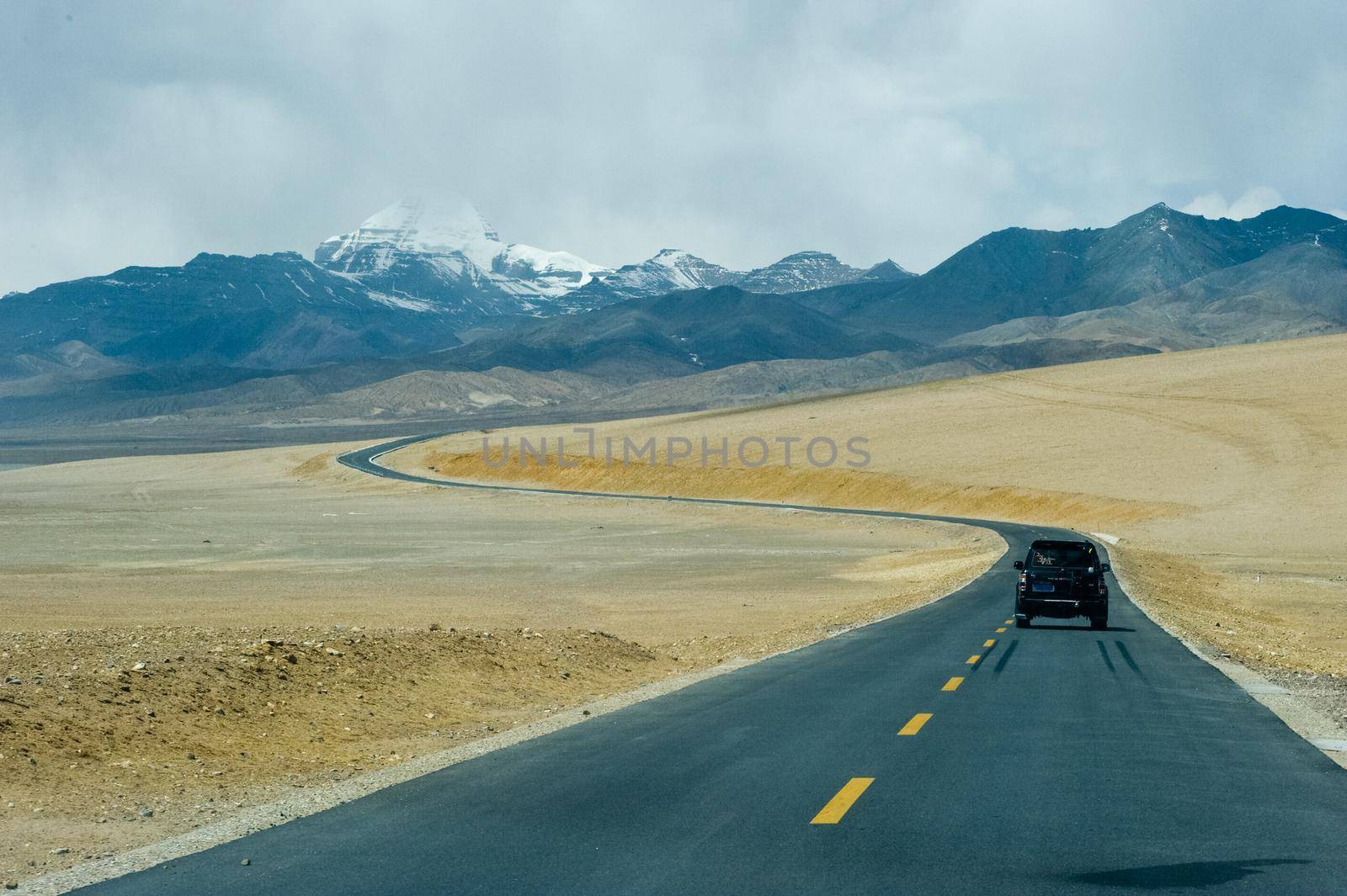 Naku, Nepal - June 23, 2016: Asphalt road in Tibet. The track in the Himalayas.