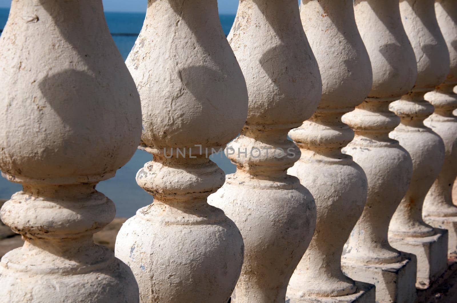 White gallery columns and sea, summer